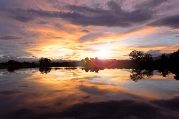 istock Wonderful sky with Sunset and reflection for nature background. 1345061766
