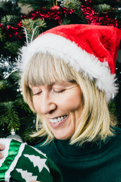 istock Senior woman enjoying Christmas 1345063249
