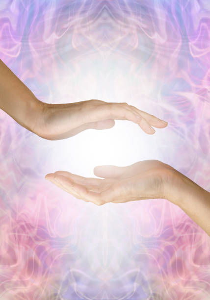 istock Sensing healing energy coming from palm chakra 1345067328