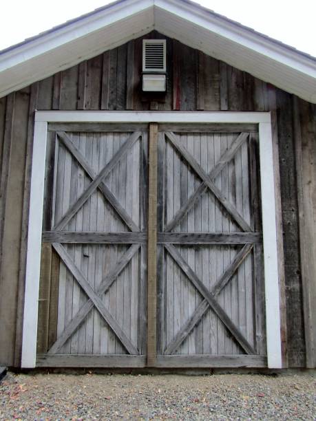 istock Stain wood barn doors. 1345071297