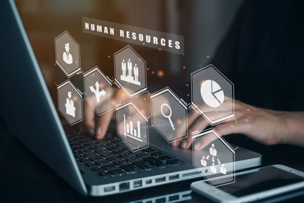 istock Businesswomen using a computer to Human Resources HR management Recruitment Employment Headhunting Concept. 1345073052