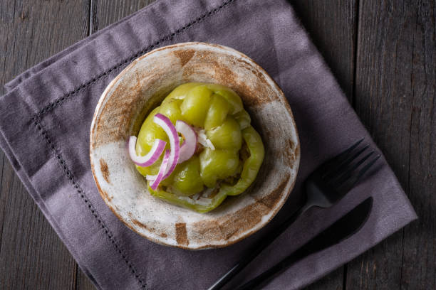 istock Green bell peppers stuffed with meat 1345073147