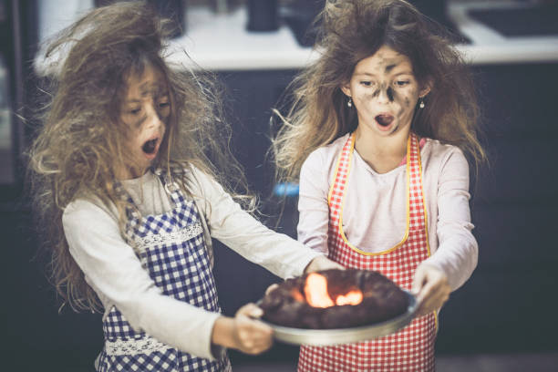 istock Oh my God, we have burnt the cake! 1345074130