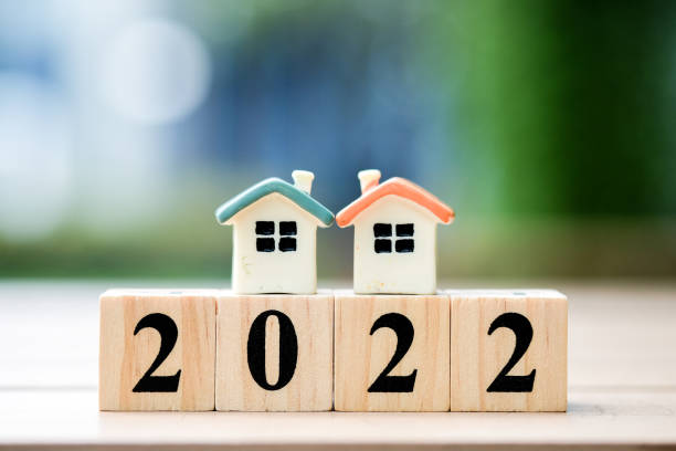 istock 2022 wooden block number with House model 1345075431