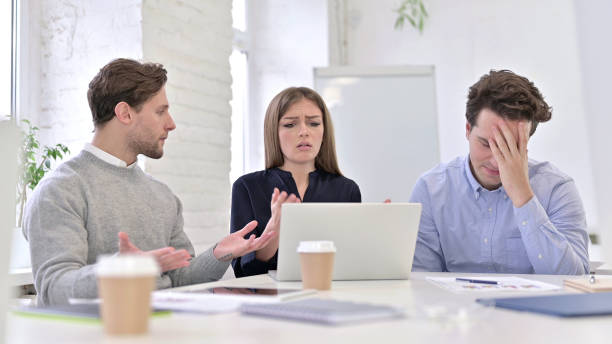 istock Creative Team Reacting to Failure on Laptop 1345077285