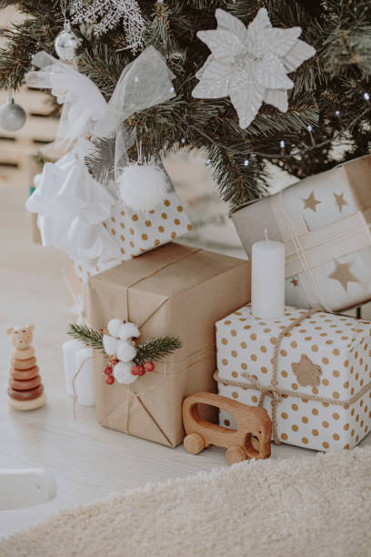 istock Christmas tree with gift boxes. New Year's decorations. New Year's interior. 1345080908