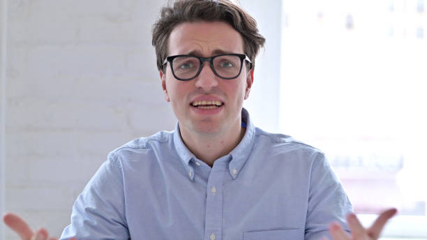 istock Portrait of Upset Angry Young Man 1345081006