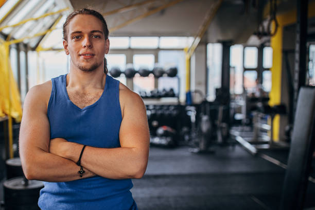 istock Strong man in gym 1345087369