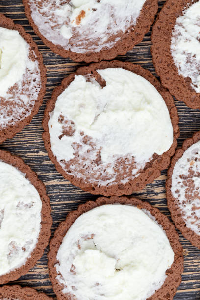 istock sweet cookies with milk filling 1345087691