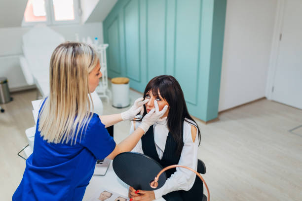 istock Patient explains to the doctor what problems she has with her face 1345092460
