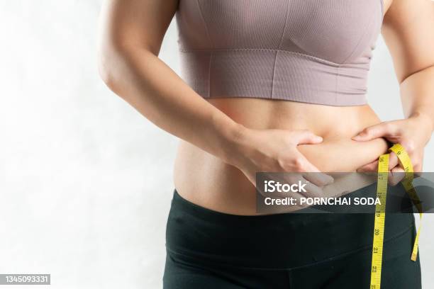 Fat Woman Fat Belly Chubby Obese Woman Hand Holding Excessive Belly Fat With Measure Tape Woman Diet Lifestyle Concept Stock Photo - Download Image Now