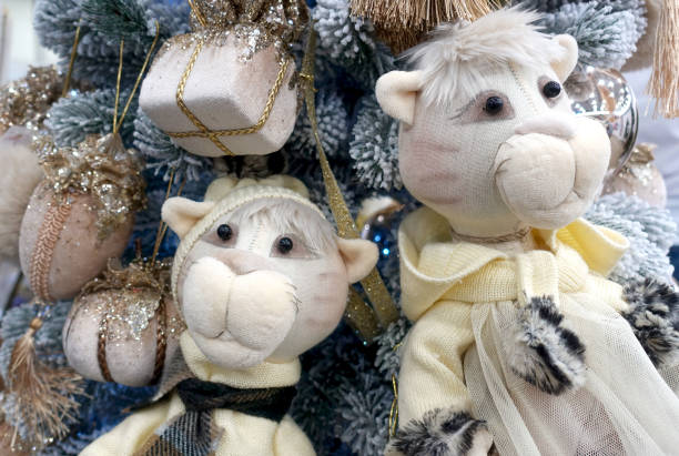 istock Toy tigers on the Christmas tree. 1345093700