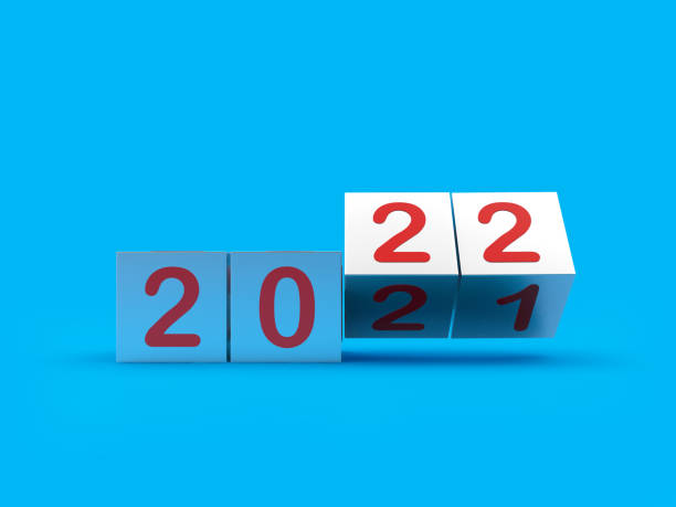 istock Silver cubes with changing numbers of the new year 2022 1345093724