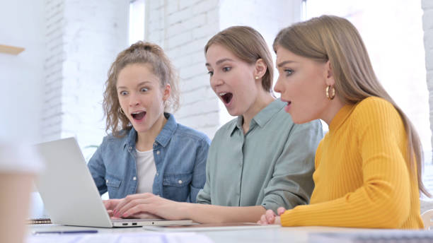 istock Startup Team Celebrating Success on Laptop 1345093767