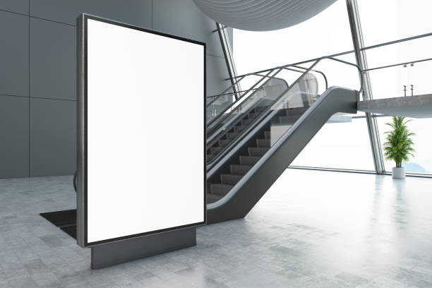 istock Empty Bilboard with Escalator in Airport or Shopping Mall 1345096244