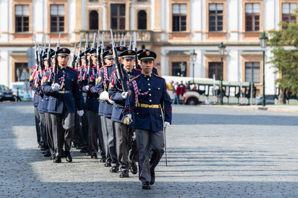 Prague, Czech Republic - June 14 2018: Three soldiers walking down to the castle.