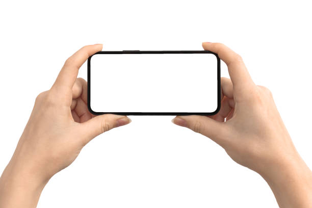 istock Hands with horizontally screen mockup isolated on a white background, mobile phone 1345101342