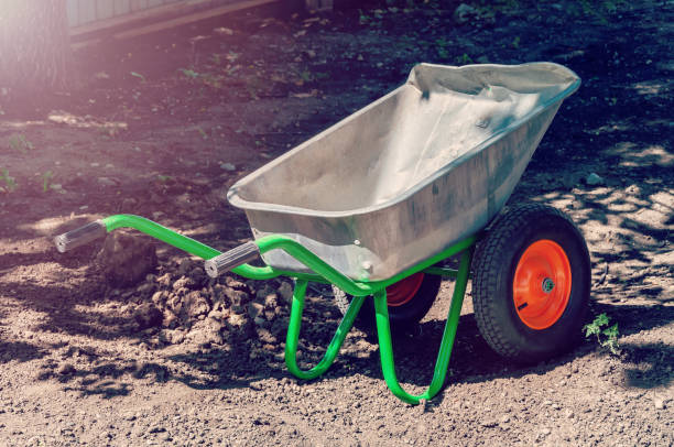 istock Empty garden wheelbarrow ready for the fall harvest. Garden tools 1345101876