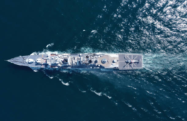 Aerial view of naval ship, battle ship, warship, Military ship resilient and armed with weapon systems, though armament on troop transports. support navy ship. Military sea transport. stock photo