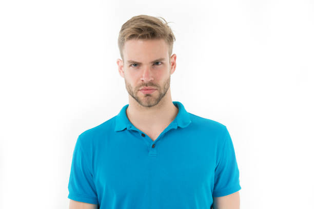Focused glance. Man bristle concentrated strict face looks at camera isolated white. Man beard unshaven guy looks handsome and cool. Guy bearded concentrated focused looking forward.