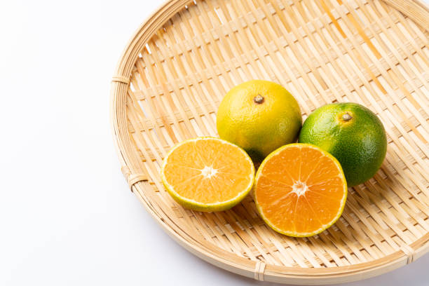 istock Japanese mandarin oranges on white background 1345106704