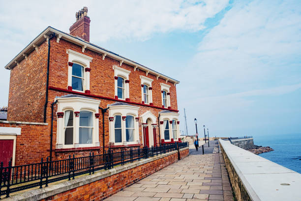 Hartlepool town, County Durham, England Hartlepool, England - September, 09 2021: Traditional brick built house on the seafront between Catherine Street and Radcliffe Terrace in the Headland area of Hartlepool, England. hartlepool photos stock pictures, royalty-free photos & images