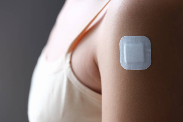 istock White patch stuck on shoulder after flu vaccination closeup 1345108467