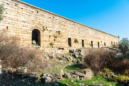 Wall of a well-preserved 99 m long and 15 m high Hellenistic market building at Alinda ancient site in Aydin province of Turkey.