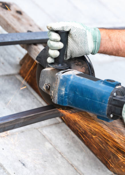 istock working with a circular saw cutting metal 1345111390
