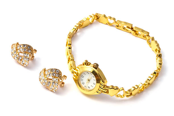 istock Golden wristwatch and earrings 134511256