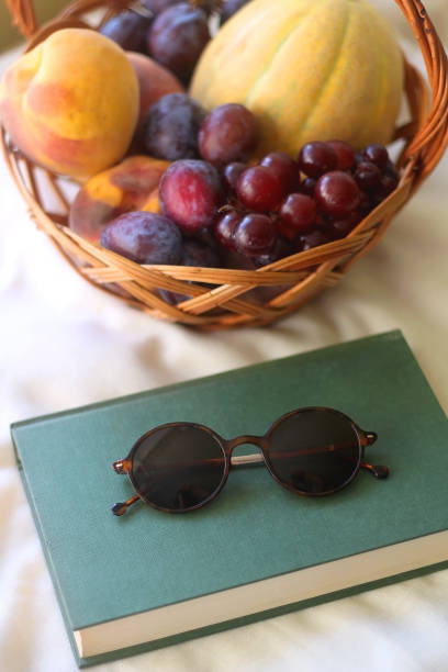 istock Picnic Basket, Book and Sunglasses 1345113016