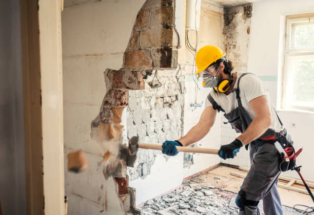 Worker using  hammer Worker using hammer, home renovation demolishing stock pictures, royalty-free photos & images