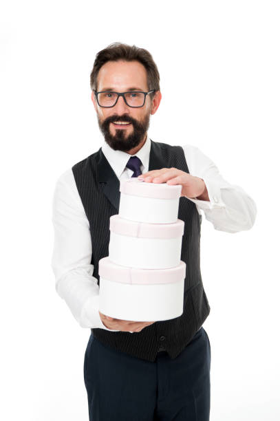 istock Man formal clothes hold pile gift boxes. Loyalty bonus concept. Loyalty reward program. Ways to promote your loyalty rewards program. Gift for client. Starter pack customer oriented business 1345114450