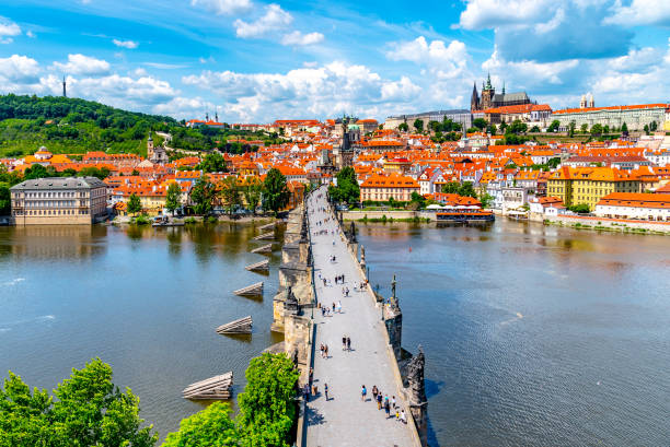 istock Prague panorama with Prague Castle, and Charles Bridge over Vltava River. View from Old Town Bridge Tower, Czech Republic 1345114632