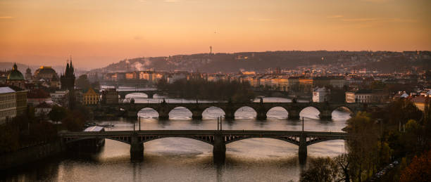 istock Prague Bridges in sunny autumn morning 1345115536