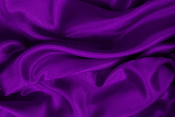 istock Purple fabric cloth texture for background and design art work, beautiful crumpled pattern of silk or linen. 1345119395