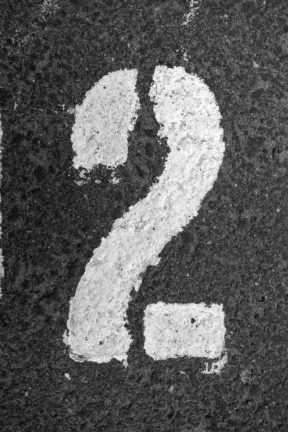 istock Number two on asphalt in black and white 1345123020