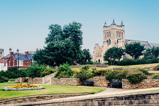 Looking north east across the public park from Town Wall towards St Hilda's Church in the Headland district of Hartlepool, England.