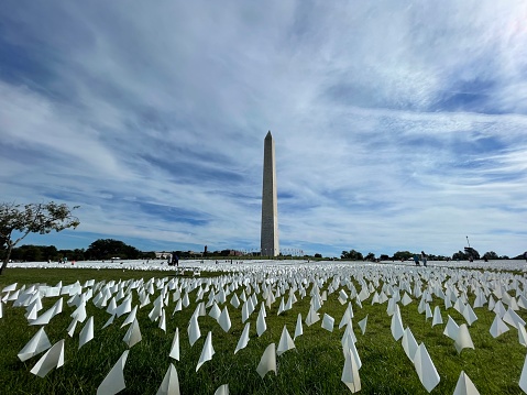 Military cemetery in the United States with headstones for soldiers white marble rows