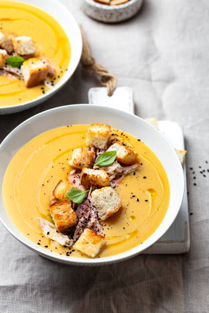 istock lentil cream soup with croutons and cumin 1345128370