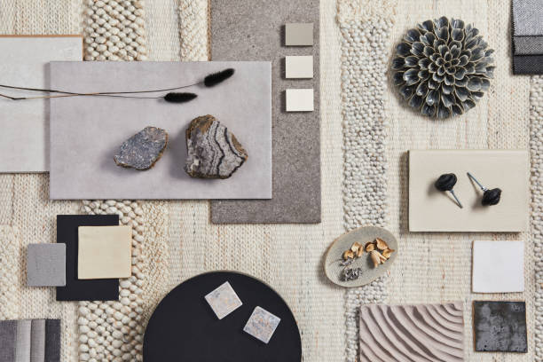 Flat lay design of creative architect mood board composition with samples of building, beige textile and natural materials and personal accessories. Top view, template.