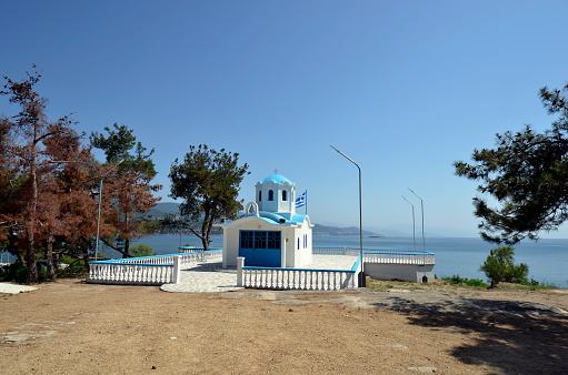 Greece, orthothox chapel on hill in Nea Iraklitsa on Aegean sea