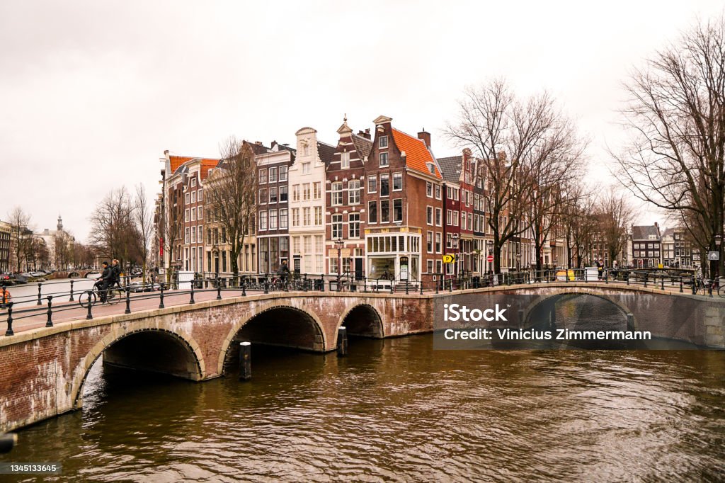 Amsterdam houses by the canal Amstel River Stock Photo