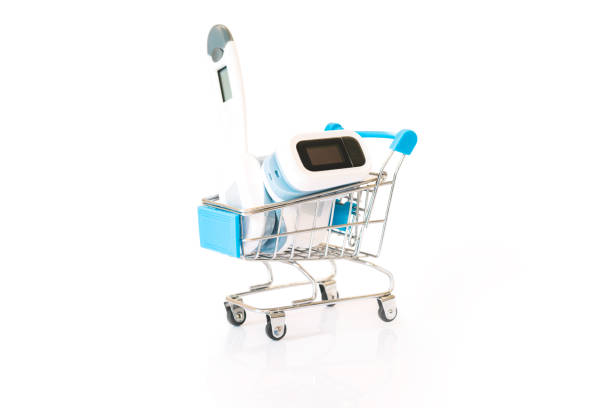 monitoring blood oxygen levels and electrical thermometer in a small trolley isolated on a white background - taking pulse oximeter medical oxygen equipment human lung imagens e fotografias de stock