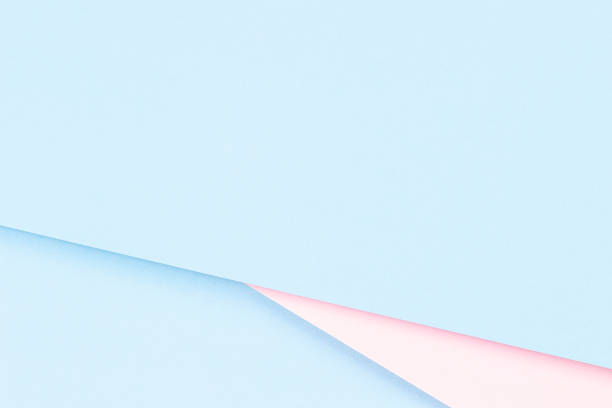 istock Abstract colored paper texture background. Minimal geometric shapes and lines in light blue and pastel pink colors 1345137154