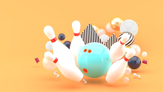 Blue bowling Among the colorful balls on the orange background.-3d rendering.\