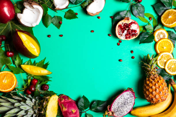 Fruit on green background