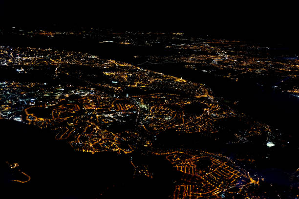 istock lisbon aerial night cityscape from airplane while landing 1345144282