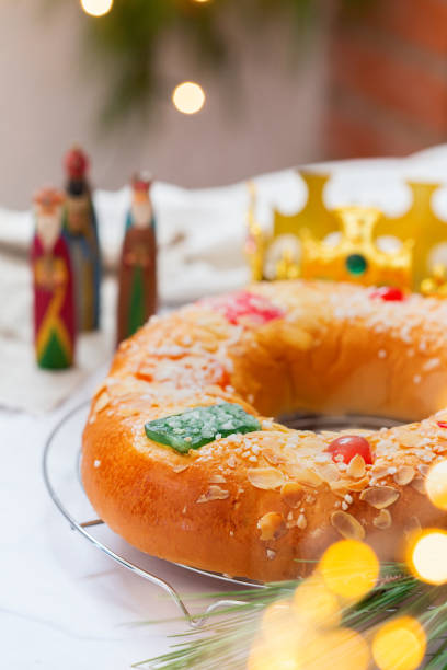 istock Traditional Spanish Epiphany cake, Roscon de Reyes with festive decorations 1345145323