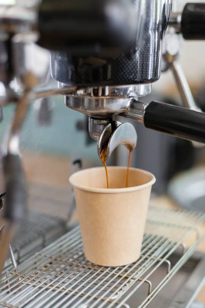 istock Vertical shot of coffee to go being prepared. 1345146973